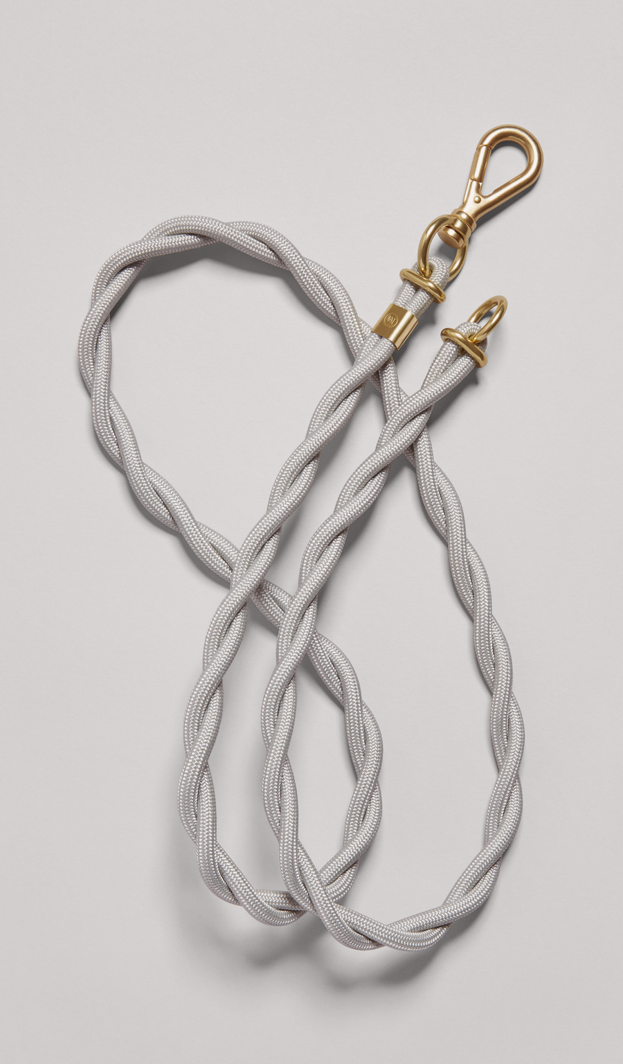 MANTLE® dog system lead in Haze with solid brass hardware, shown from an overhead view on a light gray background